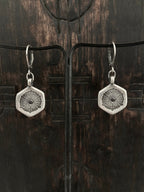 Our etched 925 sterling silver Coral Diamond earrings from an illustration of coral with black diamonds.